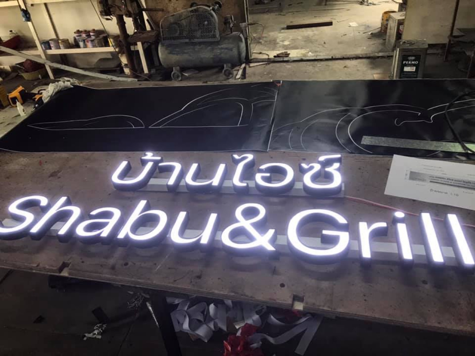 Shabu & Grill illuminated channel letters lit in the Mommy Signage workshop